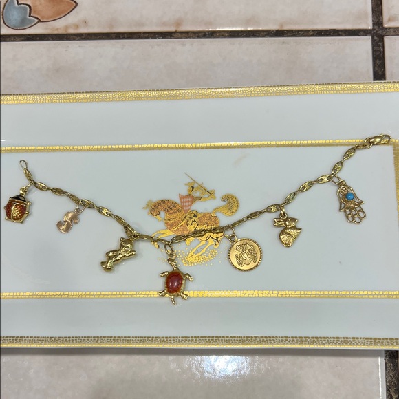 Adorable 18k charm bracelet